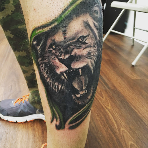 Find ufo tattoo ideas for your next unique tattoo in Roscoe at Elevated Ink Tattoo