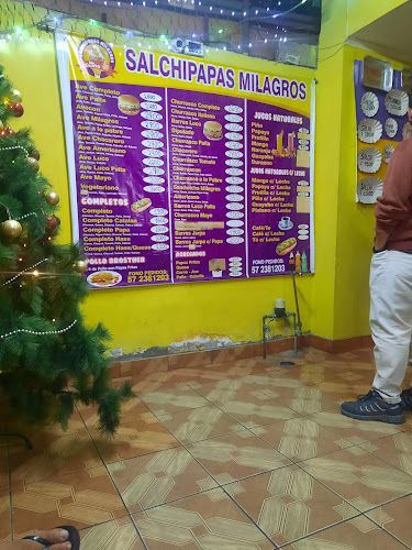 Opiniones de Salchipapas Milagro en Iquique - Restaurante