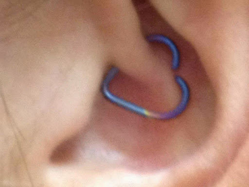 Explore ear tattoo ideas, creative tattoo ideas in Fargo, available at Almost Famous Body Piercing