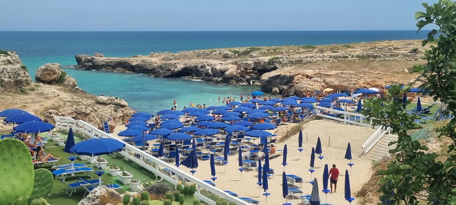 Photo of Lido Porto Camicia with blue pure water surface