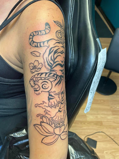 Explore flower shoulder tattoo ideas, creative tattoo ideas in Syracuse, available at Goblins Den Tattoo