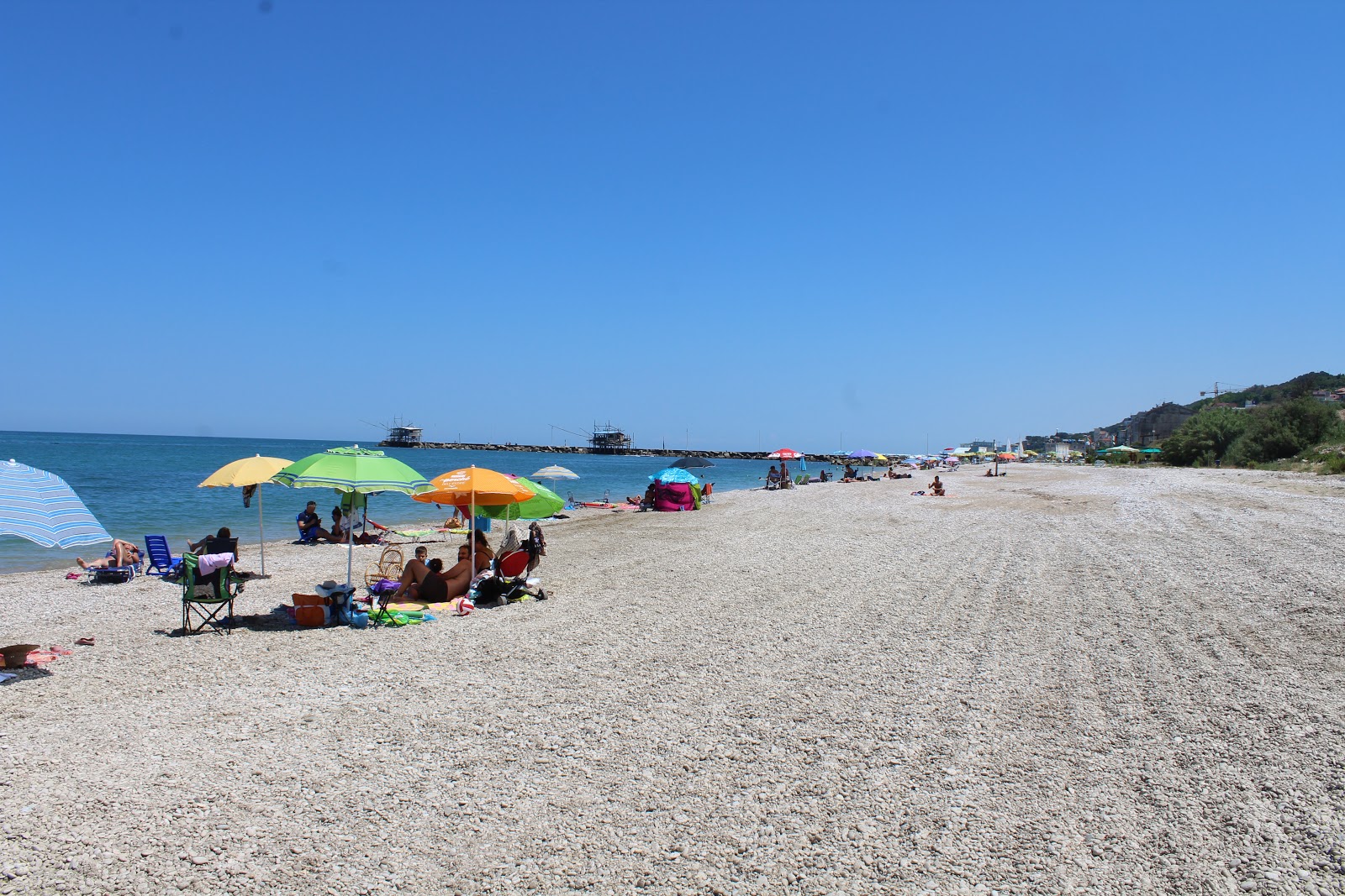 Foto von Spiaggia di Calata Cintioni mit feiner grauer kies Oberfläche