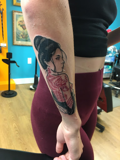 Find lesbian tattoo ideas for your next unique tattoo in Putnam at Red Spider Tattoo