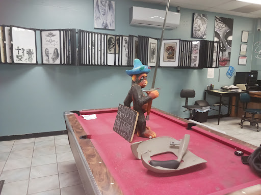 Explore honeybee tattoo ideas, creative tattoo ideas in El Paso, available at Exotic Tattoo