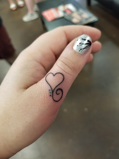Explore solar eclipse tattoo ideas, creative tattoo ideas in Fort Worth, available at Royal 1 Tattoos