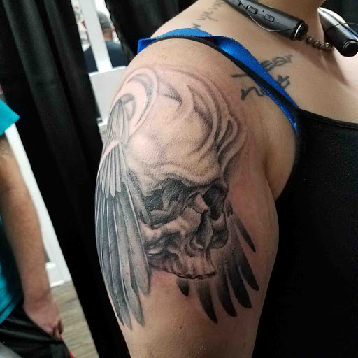 Explore wizard of oz tattoo ideas, creative tattoo ideas in Atlanta, available at Black Cloud Tattoo and Piercing