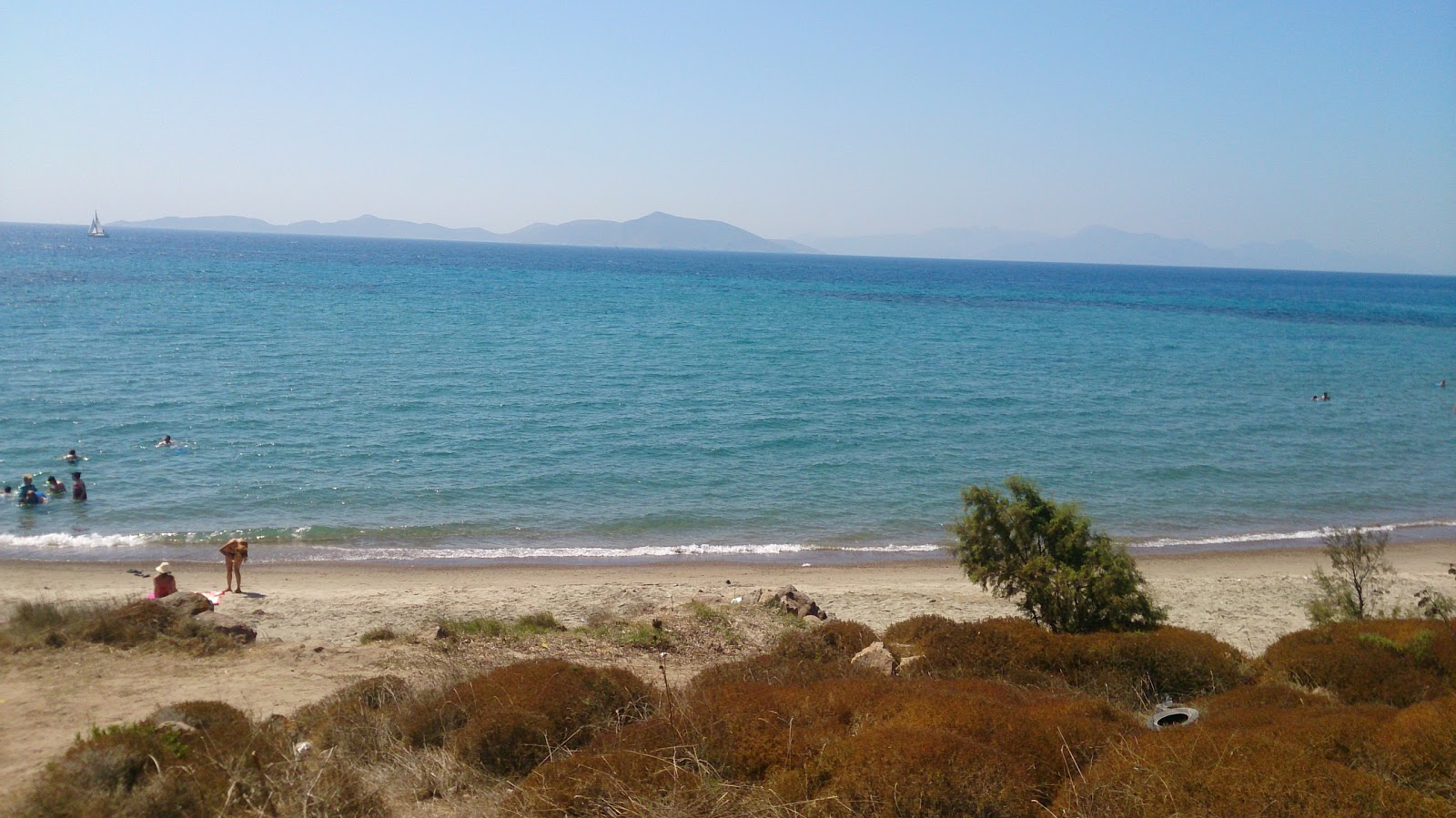 Photo de Fenerburnu Sahili avec sable lumineux de surface