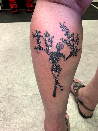 Explore dark romance tattoo ideas, creative tattoo ideas in Hudson Falls, available at ALTERED ADDICTION TATTOOS