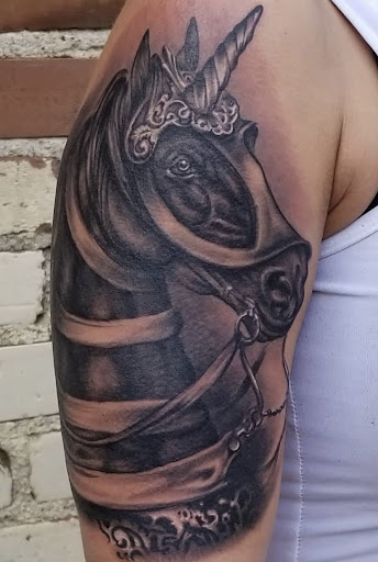 Explore tattoos tramp stamp ideas, creative tattoo ideas in Sioux City, available at Living Art Tattoo Studio