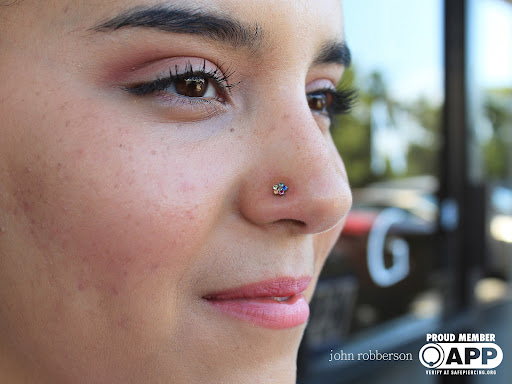 Explore leg flower tattoo ideas, creative tattoo ideas in Fort Myers, available at Tiger Lotus Tattoo and Piercing