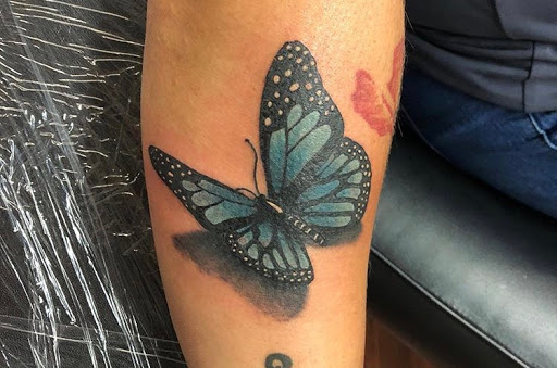 Explore son tattoo ideas for mother, creative tattoo ideas in Alamosa, available at The Shop Tattoo & Comics