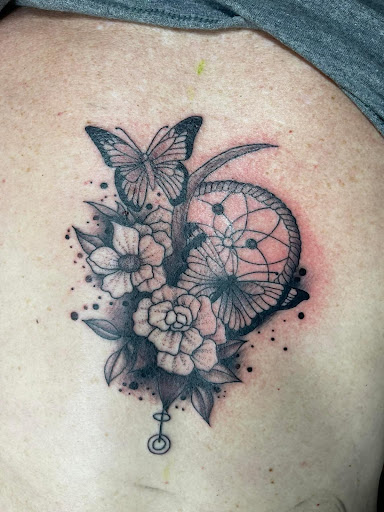 Explore outlaw tattoo ideas, creative tattoo ideas in Scott City, available at Distinked Art and Tattoo