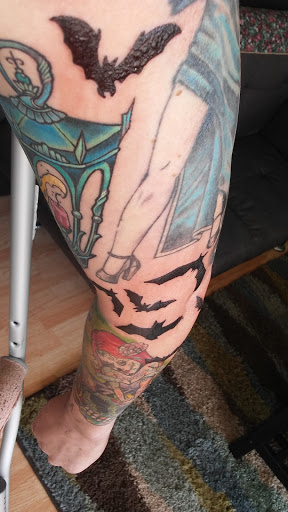 Explore back arm tattoo ideas, creative tattoo ideas in Marion, available at Iron Anchor Tattoo