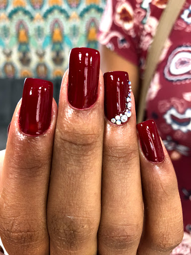 Logo da empresa - Minuzzo Ateliê de unhas