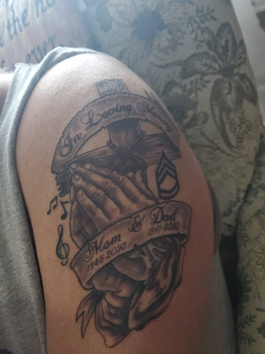 Explore tattoo ideas for photographers, creative tattoo ideas in Kingsport, available at 2 Ton Gallery