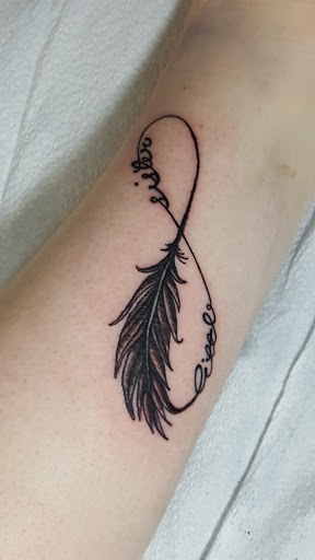 Explore stickman tattoo ideas, creative tattoo ideas in Rochester, available at Sacred Heart Studios