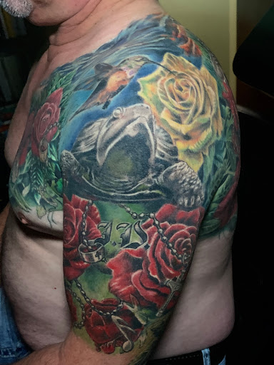 Explore cool back tattoo ideas, creative tattoo ideas in Addison, available at Cat Tattoo