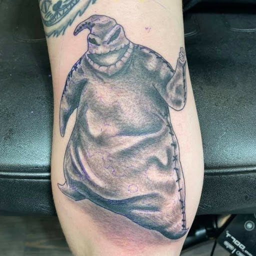 Explore marriage ring tattoo ideas, creative tattoo ideas in Mckinney, available at Borrowed Time Fine Art Gallery Tattoo Shop