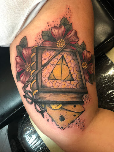 Explore family flower tattoo ideas, creative tattoo ideas in Roanoke, available at Mischief Ink Tattoo