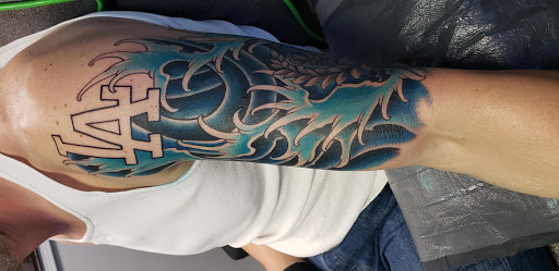 Explore family tattoo ideas for females small, creative tattoo ideas in Brentwood, available at Eleven Mag Tattoo