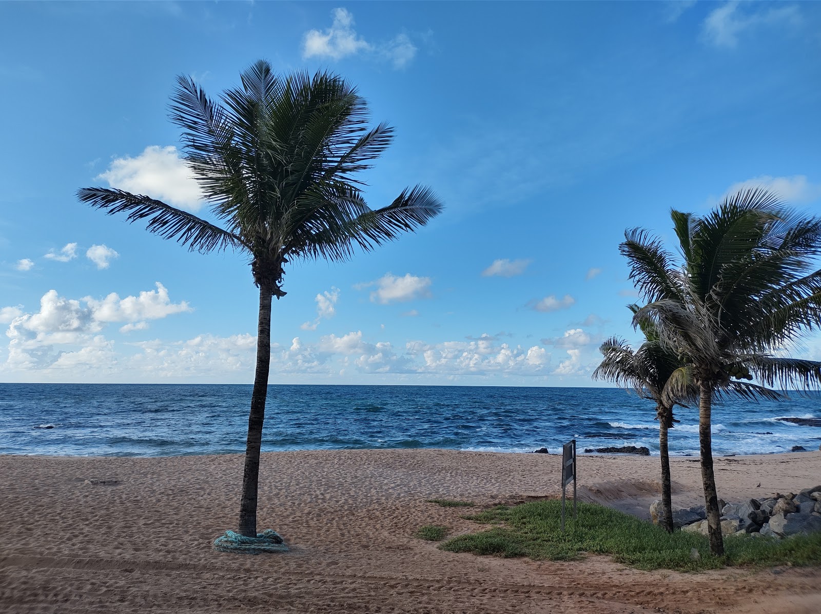 Foto van Praia Farol de Itapua en de nederzetting