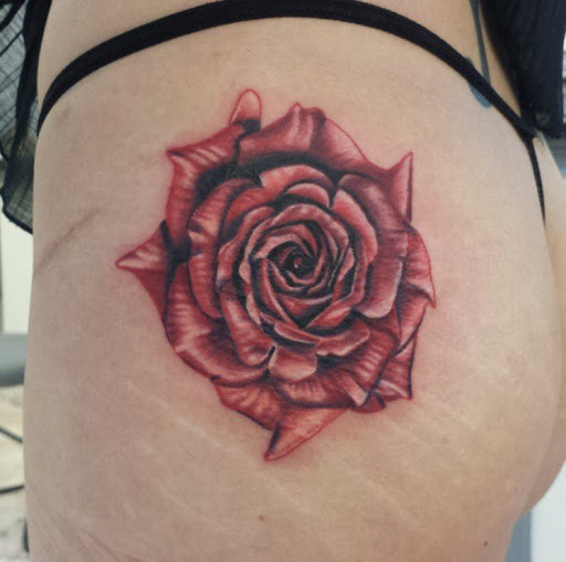 Explore shoulder flower tattoo ideas, creative tattoo ideas in San Diego, available at Sideshow Tattoo and Piercing