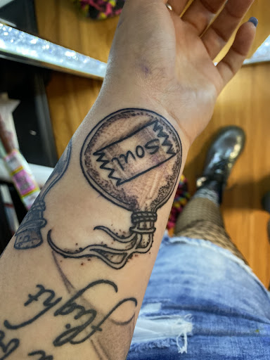 Explore religious tattoo ideas, creative tattoo ideas in Elkview, available at Andy Electric Tattoos
