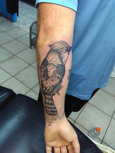 Explore dominican tattoo ideas, creative tattoo ideas in Bradenton, available at Memory Lane Tattoo Co.