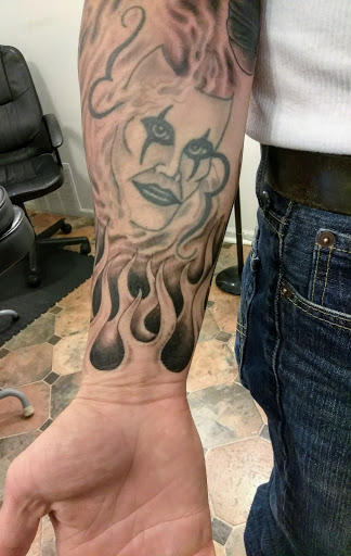 Explore love heart tattoo ideas, creative tattoo ideas in Hebron, available at Explosive Ink Tattoo