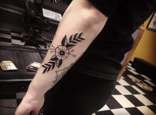 Explore royalty tattoo ideas, creative tattoo ideas in Stevens Point, available at Black Rabbit Tattooing