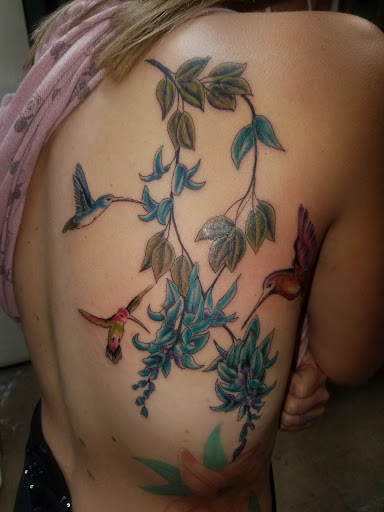 Explore fine line spine tattoo ideas, creative tattoo ideas in Odessa, available at Little Dragon Tattoos Studio