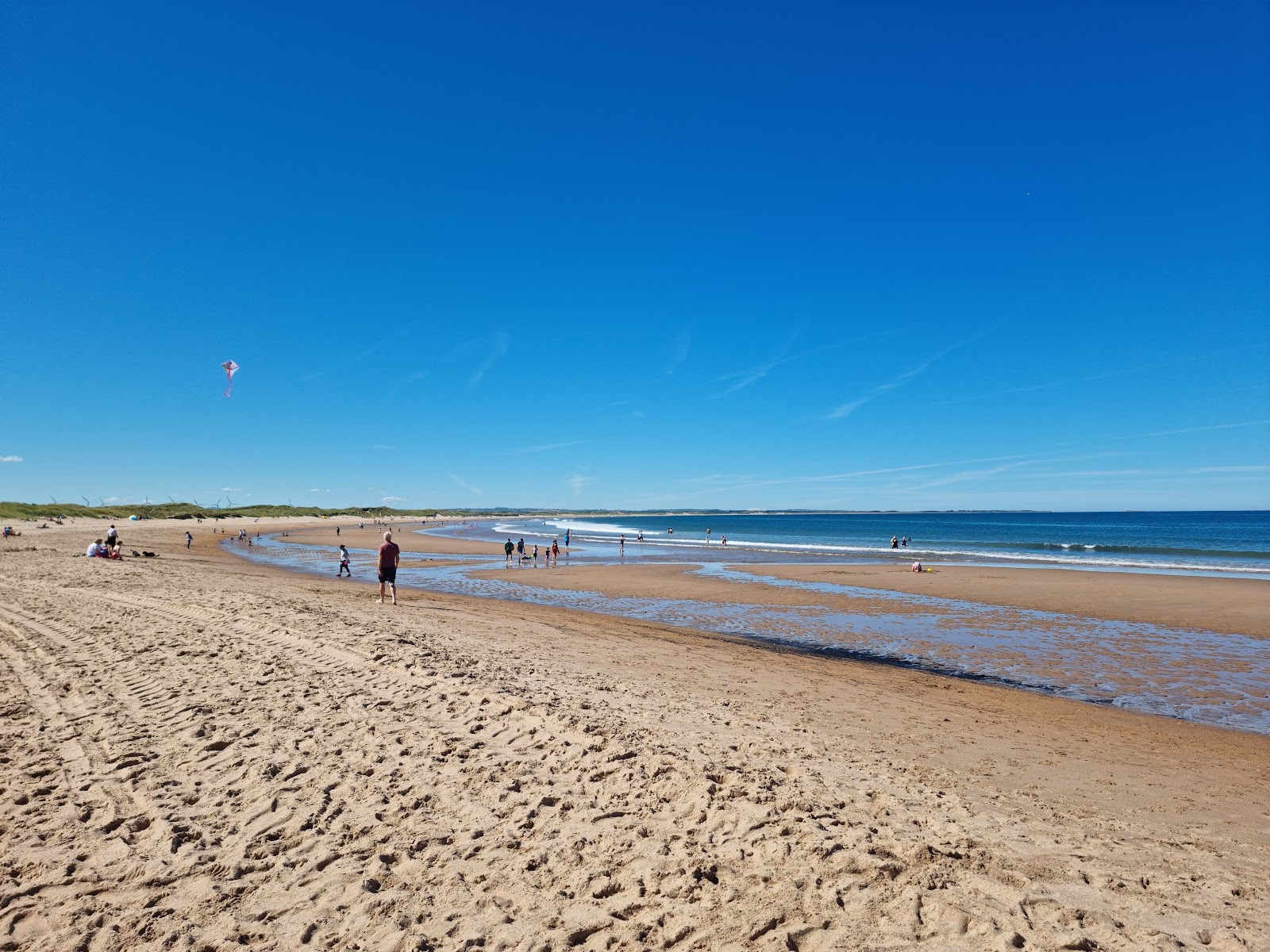 Foto af Cresswell Strand med lys sand overflade