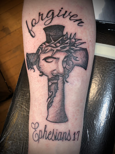 Explore cover up tattoo ideas for names on wrist, creative tattoo ideas in Calumet, available at Tattooing by Big Ben