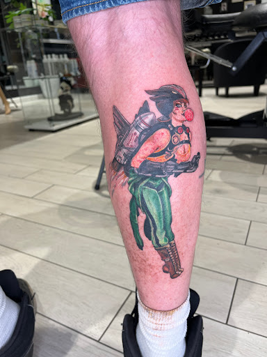 Explore calf muscle tattoo ideas, creative tattoo ideas in Tucson, available at Three Keys Tattoo