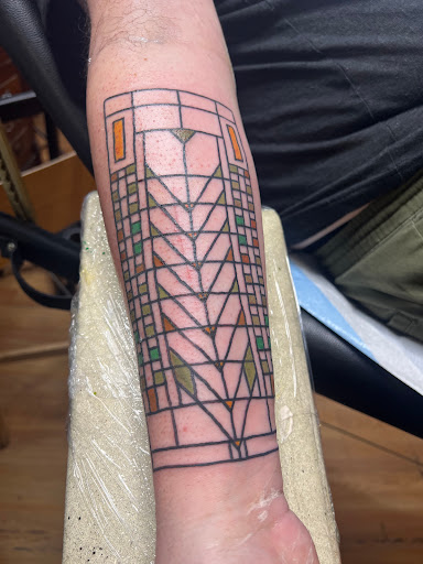 Explore angel halo tattoo ideas, creative tattoo ideas in Buffalo, available at True Gloom Tattoo Studio