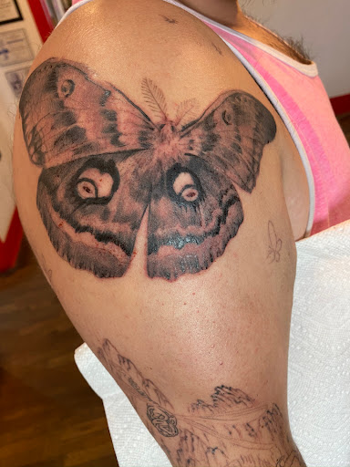 Explore logging tattoo ideas, creative tattoo ideas in Taos, available at Andersons Tattoo Parlor