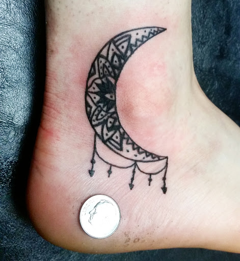 Explore foot ankle tattoo ideas, creative tattoo ideas in Erie, available at EliKingInk