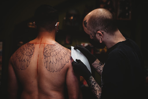 Explore filmmaker tattoo ideas, creative tattoo ideas in Savannah, available at Tramp Art Studios