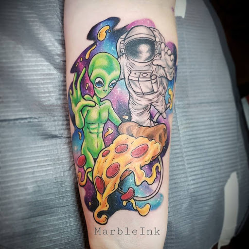 Explore charm tattoo ideas, creative tattoo ideas in Rochester, available at Mellow Madness Tattoo Parlor