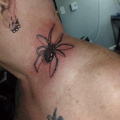 Explore blue rose tattoo ideas, creative tattoo ideas in Kewanee, available at Splat Ink tattoos and piercings