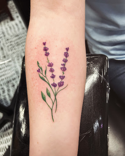 Explore unconditional love symbol tattoo ideas, creative tattoo ideas in Enid, available at Tangent Wallflower Tattoo