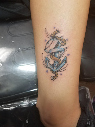 Explore tribal cover up tattoo ideas, creative tattoo ideas in Foley, available at Black Sheep Custom Tattoos and Piercings