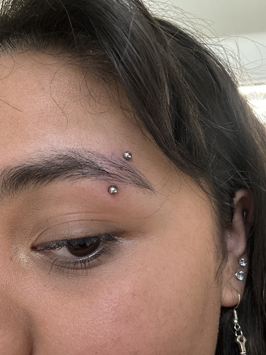 Explore hand tattoo ideas male, creative tattoo ideas in Orange, available at Baron Art Tattoo