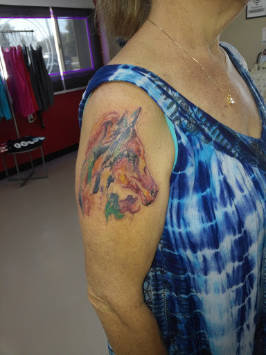 Tattoo Shop «Kings & Queens Tattoo Studio», reviews and photos, 2757 N Dixie Hwy, Monroe, MI 48162, USA