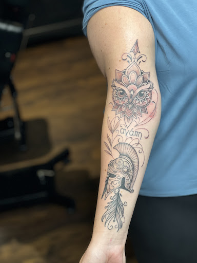 Explore spark plug tattoo ideas, creative tattoo ideas in Loveland, available at R&G Body Art