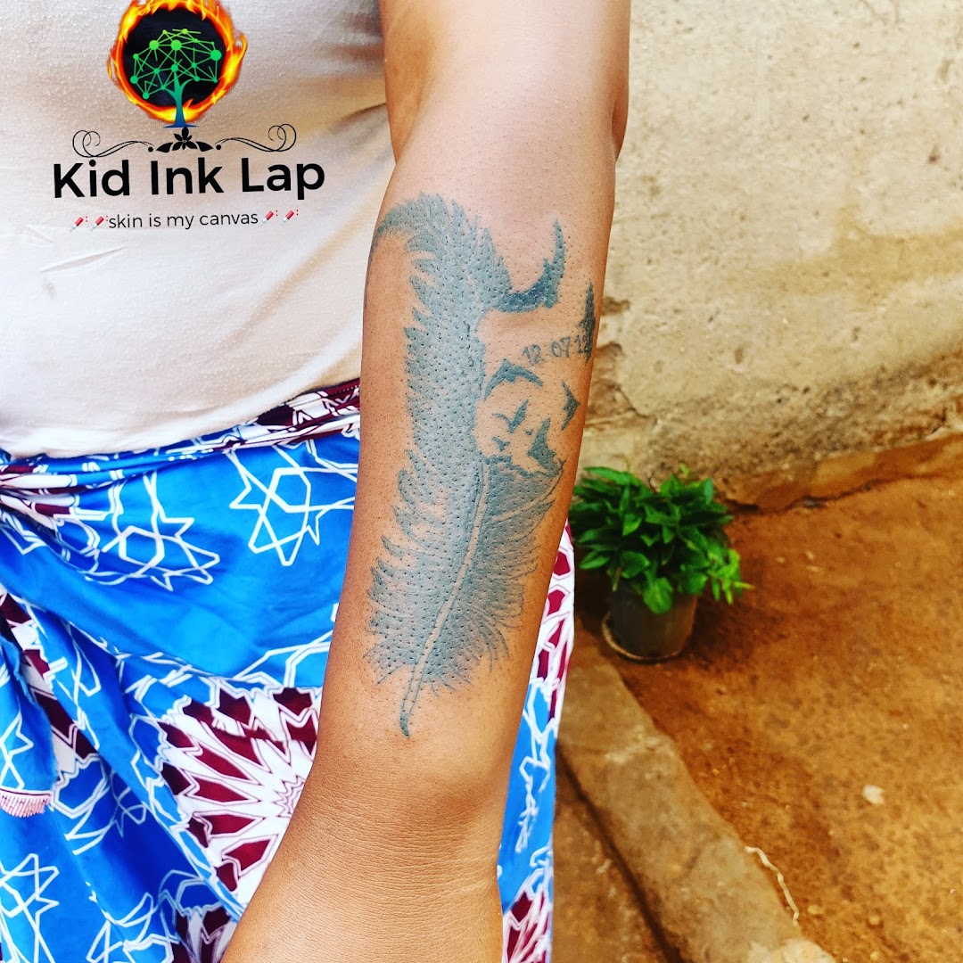 Kid ink tattoo lap