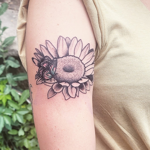 Explore muscle tattoo ideas, creative tattoo ideas in Carbondale, available at Bonedale Tattoo