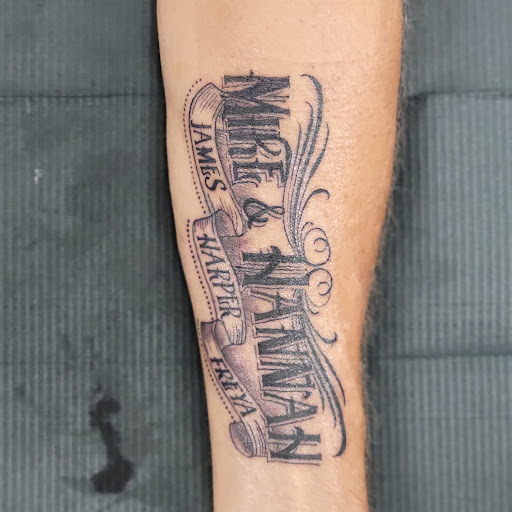 Find under boob tattoo ideas for your next unique tattoo in Ocala at Black Lotus Tattoo & Art Gallery Inc