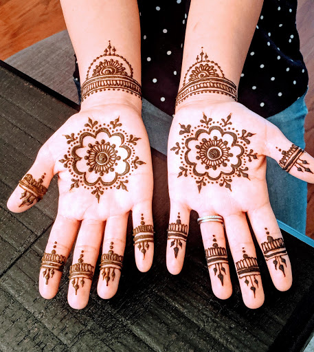 Explore cross wrist tattoo ideas, creative tattoo ideas in Concord, available at Naseera Fazil Henna Art