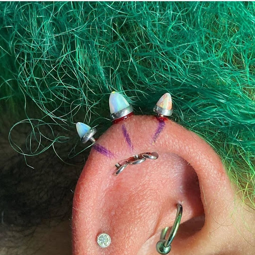 Explore mermaid tail tattoo ideas, creative tattoo ideas in North Charleston, available at Exotic Impressions Body Piercing